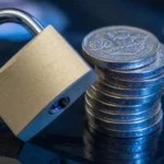 Padlock resting on a stack of British pound coins, AI-generated illustration
